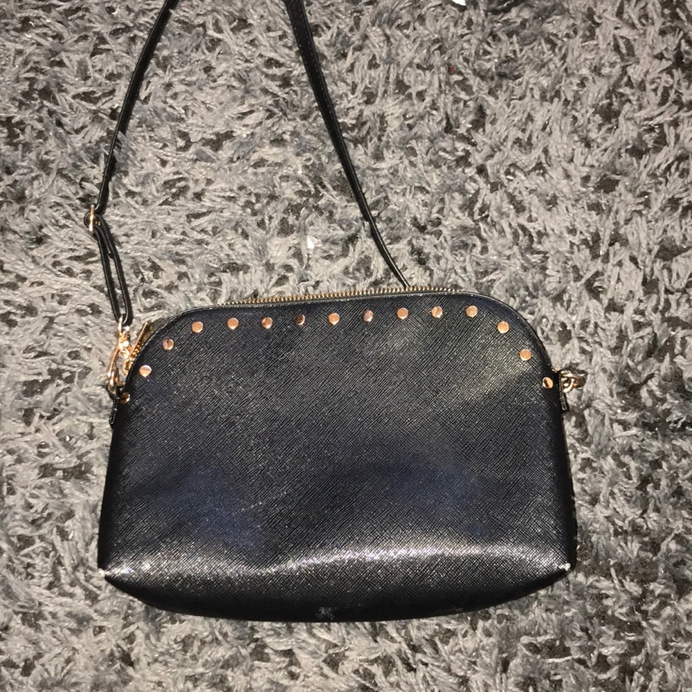 Black crossbody bag with gold detailing